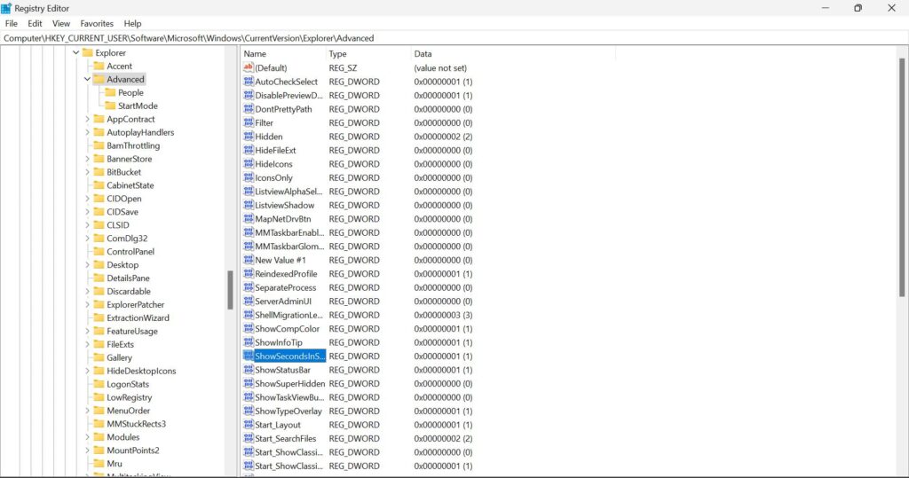 ShowSecondsInSystemClock is selected in Registry Editor